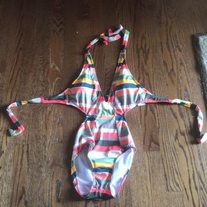 Multi colored one piece swimsuit. Never worn.